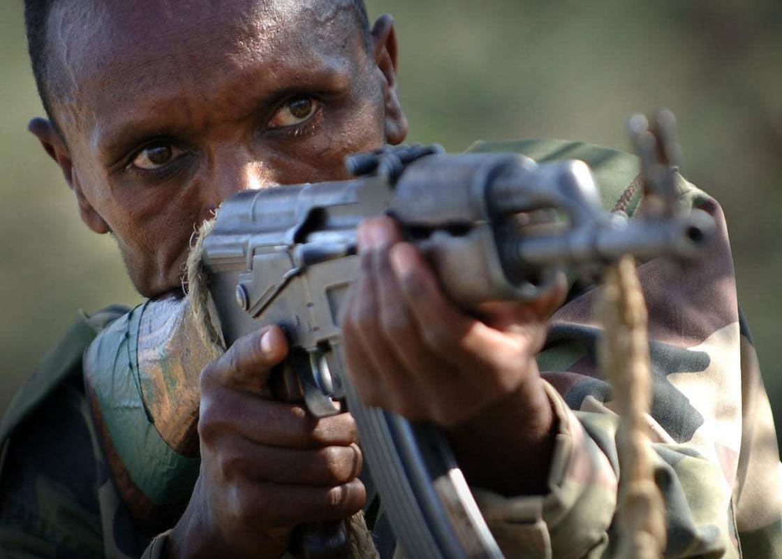 Ethiopian soldier aiming with an AK-47.