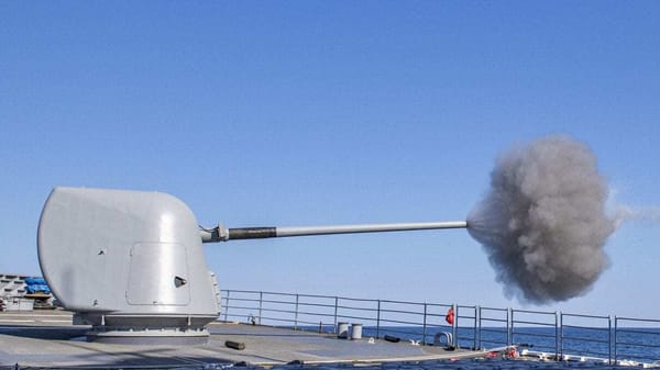 USS Normandy (CG 60) fires its forward Mark 45 mod 4 5-inch gun during a live-fire exercise.