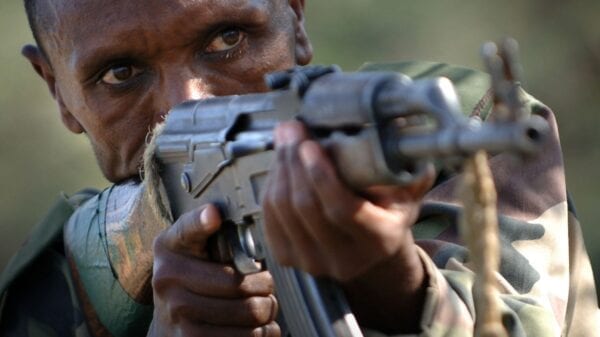 Ethiopian soldier aiming with an AK-47.
