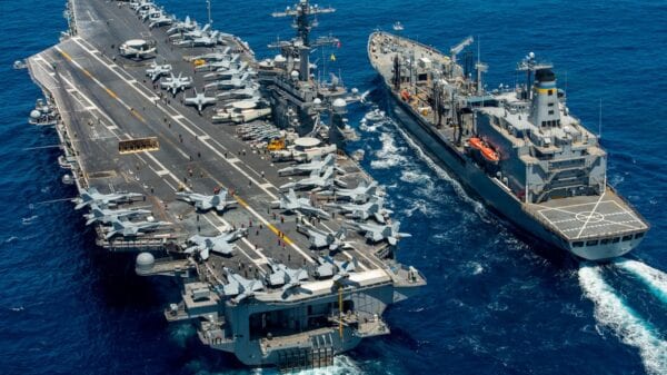 USS Carl Vinson (CVN 70) conducts a replenishment-at-sea with USNS Yukon.