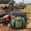 US Marine Corps (USMC) members from L Company, 3rd Battalion, 3rd Marine Regiment, 3rd Marine Division, perform a biathlon on the Camp Hansen ranges, firing a Colt 5.56mm M16A2 Assault Rifle.