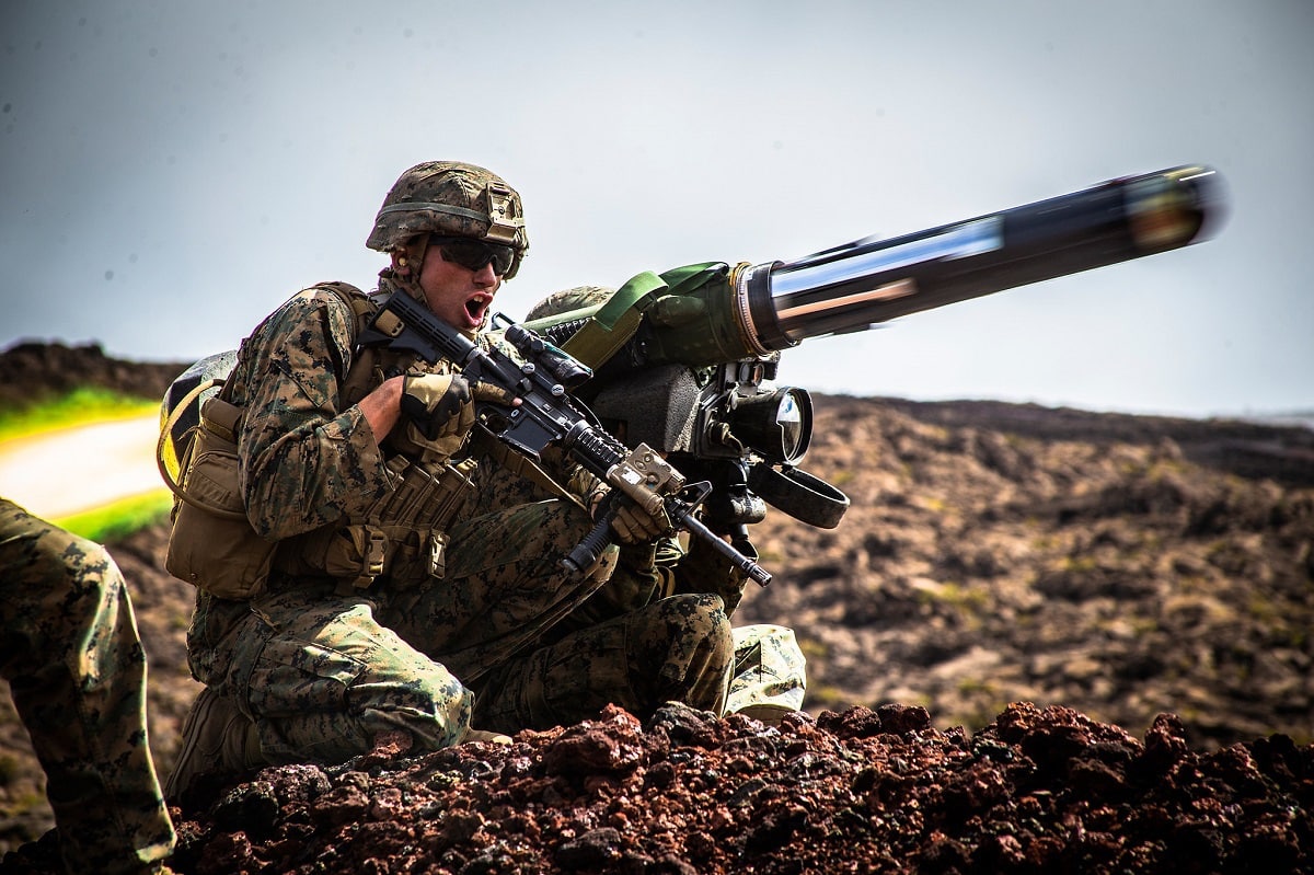 POHAKULOA TRAINING AREA, Hawaii (May 15, 2019) - U.S. Marine Corps Sgt. Troy Mole, section leader, Combined Anti-Armor Team, Weapons Company, 2nd Battalion, 3rd Marine Regiment, fires a shoulder-fired Javelin missile during Exercise Bougainville II on Range 20A, Pohakuloa Training Area, Hawaii, May 15, 2019. Bougainville II is the second phase of pre-deployment training conducted by the battalion in order to enhance unit cohesion and combat readiness. (U.S. Marine Corps photo by Lance Cpl. Jacob Wilson) 190515-M-LK264-0004.