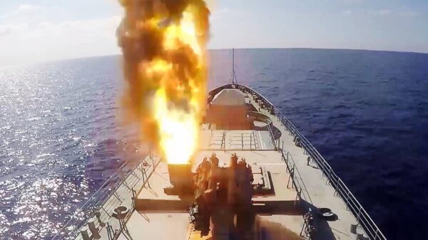 Russian Naval vessels firing a cruise missile. Image Credit: Screenshot from YouTube.