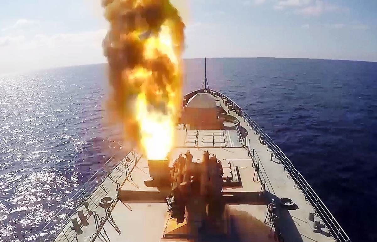 Russian Naval vessels firing a cruise missile. Image Credit: Screenshot from YouTube.