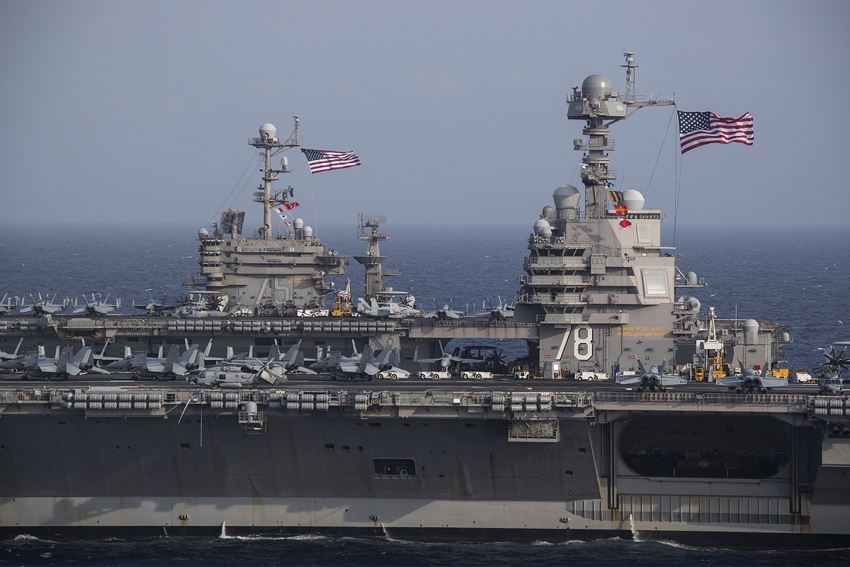 ATLANTIC OCEAN (June 4, 2020) The Ford-class aircraft carrier USS Gerald R. Ford (CVN 78) and the Nimitz-class aircraft carrier USS Harry S. Truman (CVN 75) transit the Atlantic Ocean, June 4, 2020, marking the first time a Ford-class and a Nimitz-class aircraft carrier have operated together underway. Gerald R. Ford is underway conducting integrated air wing operations and the Harry S. Truman Carrier Strike Group remains at sea in the Atlantic Ocean as a certified carrier strike group force ready for tasking in order to protect the crew from the risks posed by COVID-19, following their successful deployment to the U.S. 5th and 6th Fleet areas of operation. (U.S. Navy photo by Mass Communication Specialist 2nd Class Ruben Reed/Released