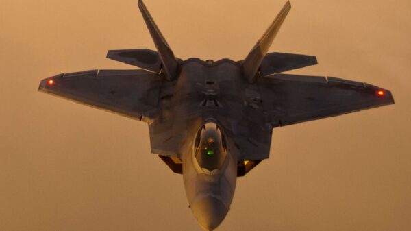 F-22 Raptors from Tyndall Air Force Base, Fla. fly in formation behind a KC-135 Stratotanker from Altus Air Force Base, Okla. after air refueling over New York, Aug. 21, 2012. (U.S. Air Force photo/Airman 1st Class Kenneth W. Norman)