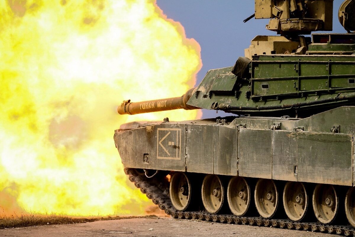 A M1 Abrams tank from 5th Squadron, 4th Cavalry Regiment, 2nd Armored Brigade Combat Team, 1st Infantry Division, fires a round during a Combined Arms Live Fire Exercise (CALFEX) at Grafenwoehr Training Area, Germany, Mar 26, 2018. Image Credit: Creative Commons.