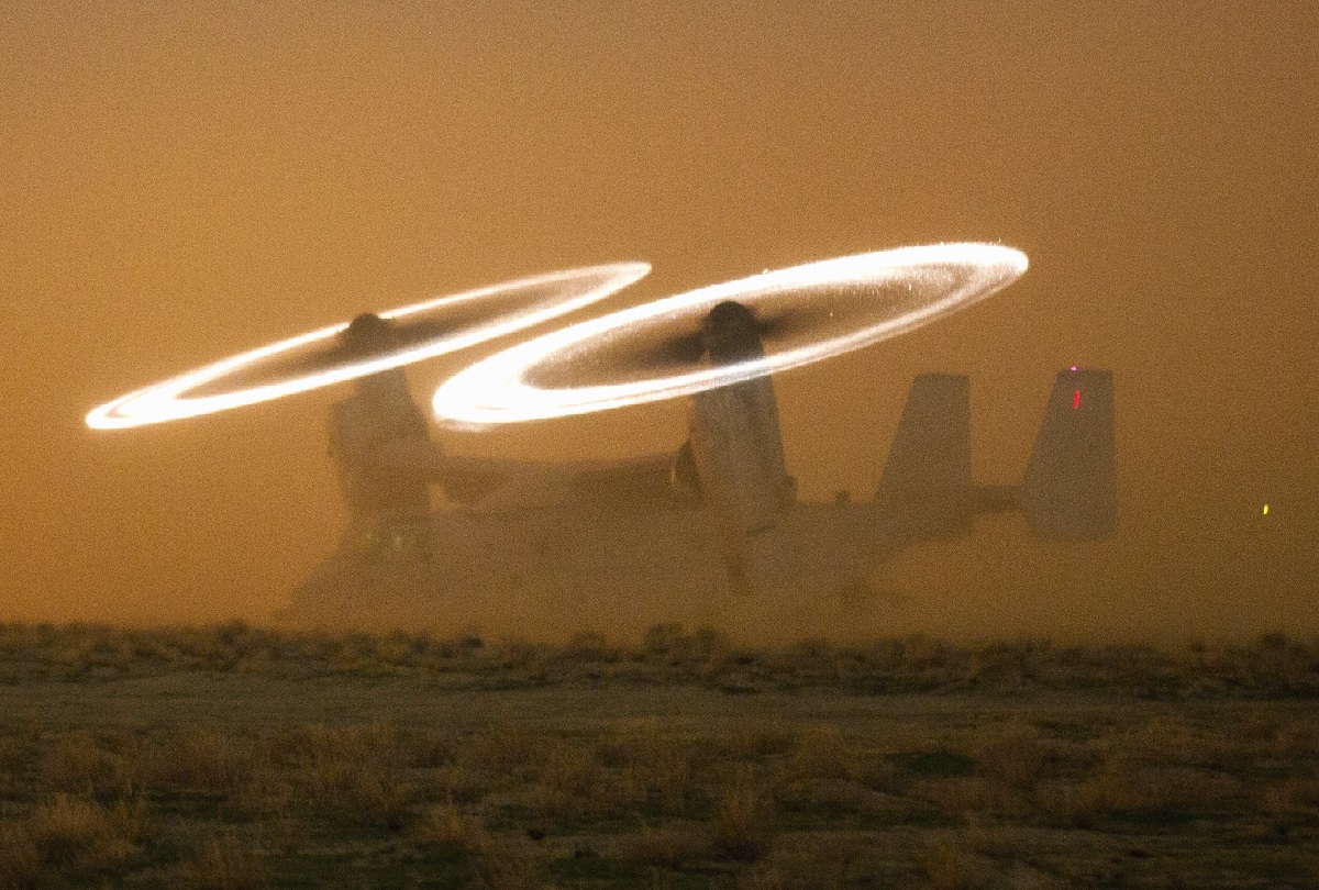 A Marine Corps MV-22 Osprey assigned to Special Purpose Marine Air-Ground Task Force-Crisis Response-Central Command stages on a hasty landing zone during a tactical recovery of aircraft and personnel drill at an undisclosed location in Southwest Asia, Nov. 16, 2015.