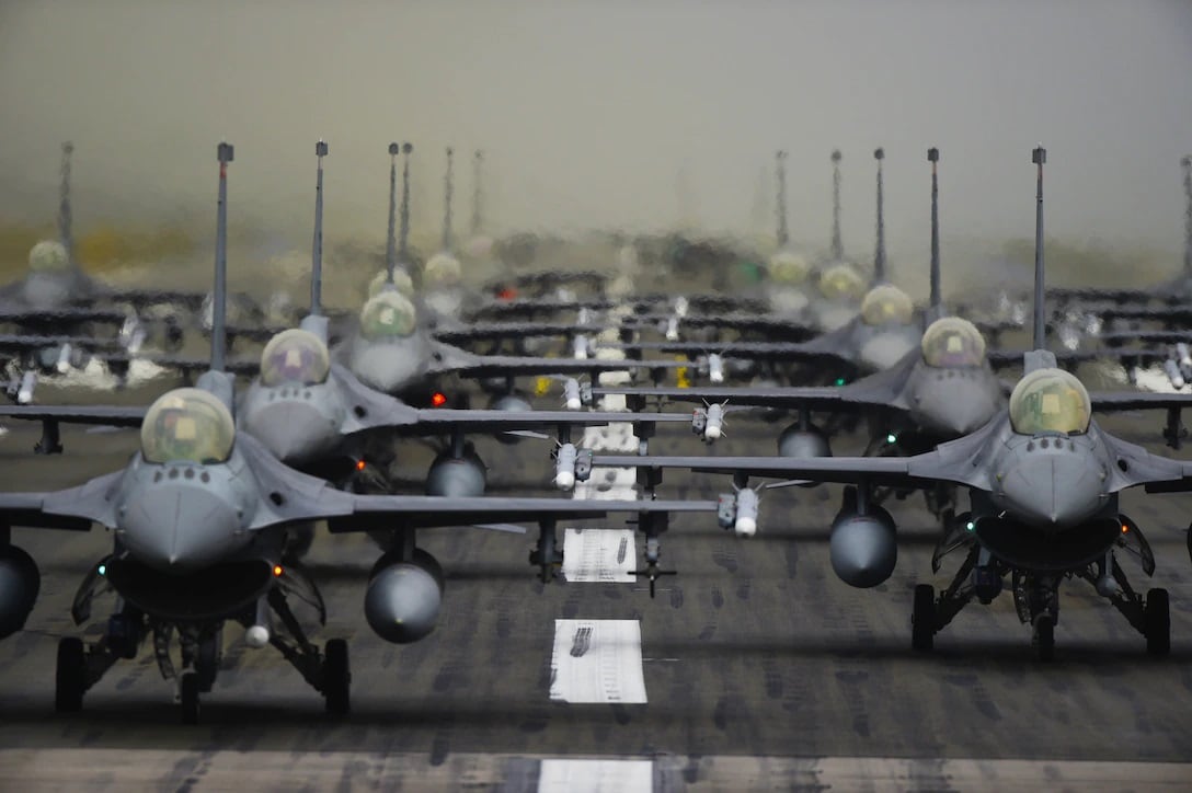 U.S. Air Force 52nd Fighter Wing F-16 Fighting Falcons line up in formation on the runway for a show of forces display at Spangdahlem Air Base, Germany, Oct. 1, 2019. The 52nd FW has a suppression of enemy air defenses mission and must be able to respond to emerging competitors. (U.S. Air Force photo by Staff Sgt. Joshua R. M. Dewberry)