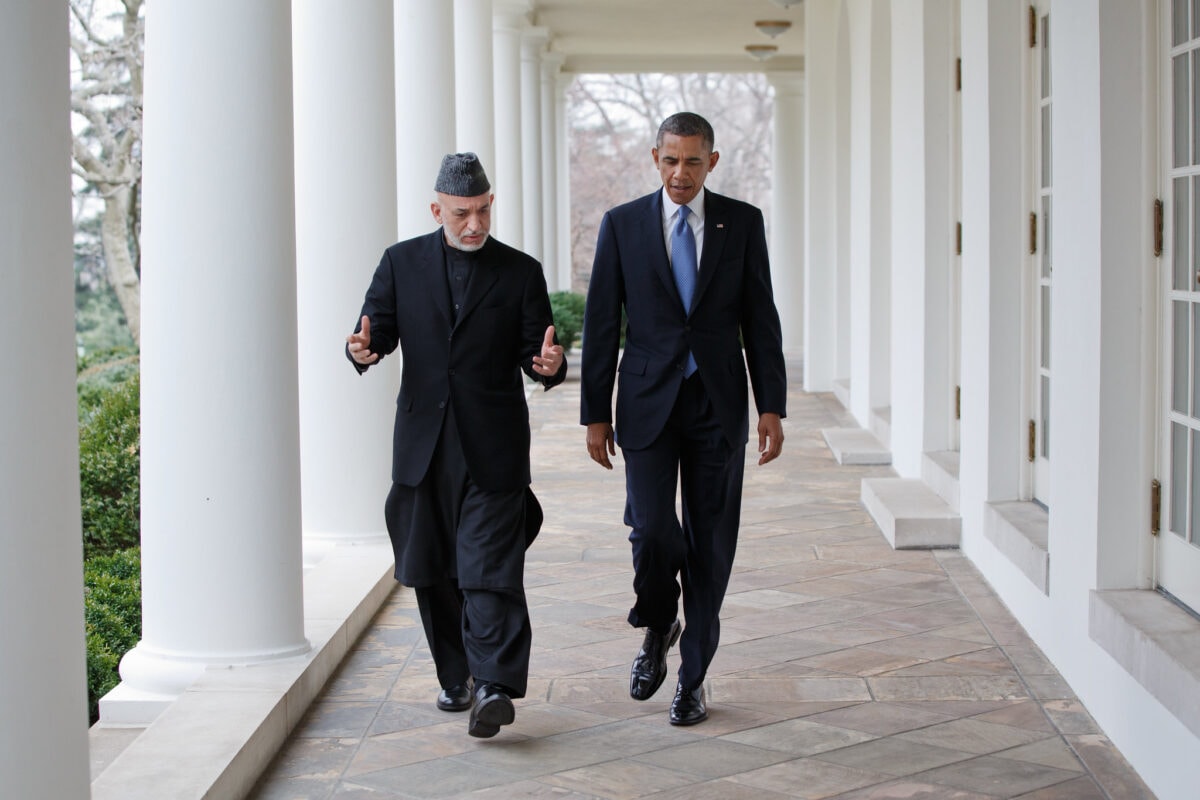 President Barack Obama and President Hamid Karzai of Afghanistan walk on the Colonnade of the White House 