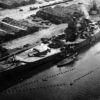 80-G-37325: Operation Torch, Battle of Casablanca, Invasion of North Africa, November 1942. View of French battleship Jean Bart, following attack by Allied gunfire and aerial bombardment. Aerial photograph taken by aircraft from USS Ranger (CV 4), 11 November 1942. Official U.S. Navy Photograph, now in the collections of the National Archives. (2014/4/3).