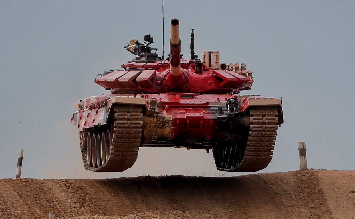 A T-72 B3 tank operated by a crew from Russia jumps during the Tank Biathlon competition at the International Army Games 2020 in Alabino, outside Moscow, Russia September 2, 2020. REUTERS/Maxim Shemetov