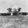 A kamikaze aircraft explodes after crashing into Essex's flight deck amidships 25 November 1944. Image Credit: Creative Commons.