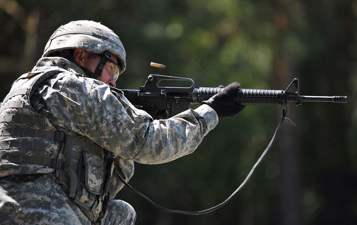 Capt. Bryson McElyea, assigned to 24th Military Intelligence Battalion in Wiesbaden, Germany, fires the M16 rifle during United States Army Europe's Best Junior Officer Competition (BJOC) in Grafenwoehr, Germany, July 24, 2012. The BJOC, unique to the U.S. Army in Europe, is a training event for company-grade officers ranking from 2nd Lt. to Capt. meant to challenge and refine competitors' leadership and cognitive decision-making skills in a high-intensity environment. (U.S. Army photo by Visual Information Specialist Gertrud Zach/Released).