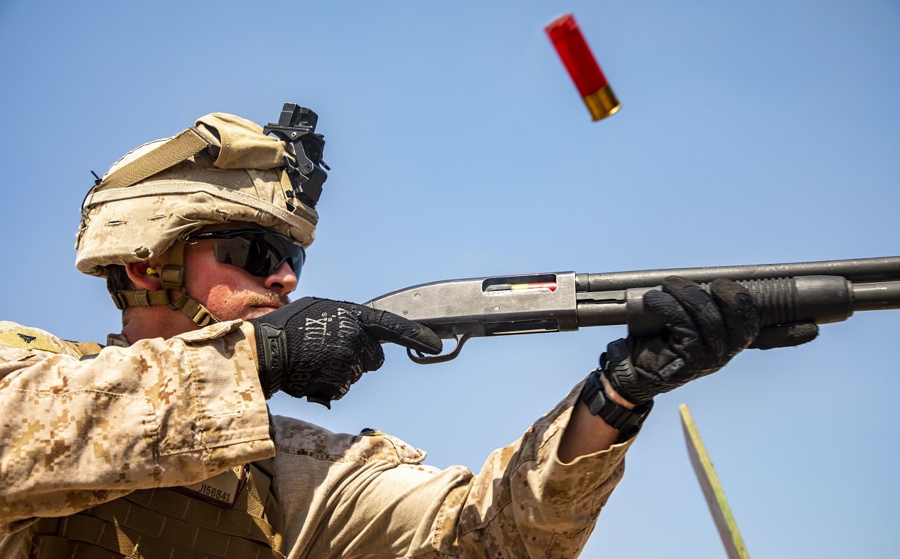 A U.S. Marine with 2nd Battalion, 7th Marines, assigned to the Special Purpose Marine Air-Ground Task Force-Crisis Response-Central Command (SPMAGTF-CR-CC) 19.2, cycles 12-gauge buckshot in a Mossberg 590A1 12-gauge shotgun at range at the Baghdad Embassy Compound in Iraq, May 8, 2020. The SPMAGTF-CR-CC is a crisis response force, prepared to deploy a variety of capabilities across the region. (U.S. Marine Corps Photo by Cpl. Brendan Custer)