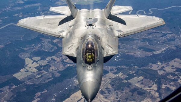 A U.S. Air Force KC-135 Stratotanker with the 434th Air Refueling Wing, Indiana, which had an aircrew with the 63rd Air Refueling Squadron, Florida, refuels a F-22 Raptor with the 325th Fighter Wing, Florida on February 23, 2021. The Stratotanker was on loan to MacDill Air Force Base. (U.S. Air Force photo by Senior Airman Tiffany A. Emery)