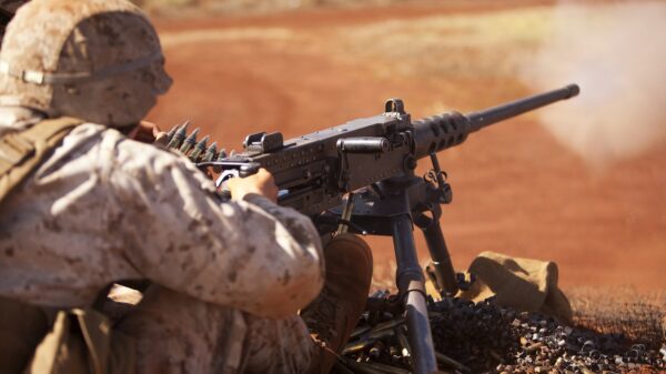 Pfc. Daniel Stillwell, a machine gunner with Charlie Company, 1st Battalion, 3rd Marine Regiment, shoots the .50 caliber M2 Browning machine gun during crew-served weapons training at Schofield Barracks, Oct. 8 to Oct. 10. Image: Creative Commons.