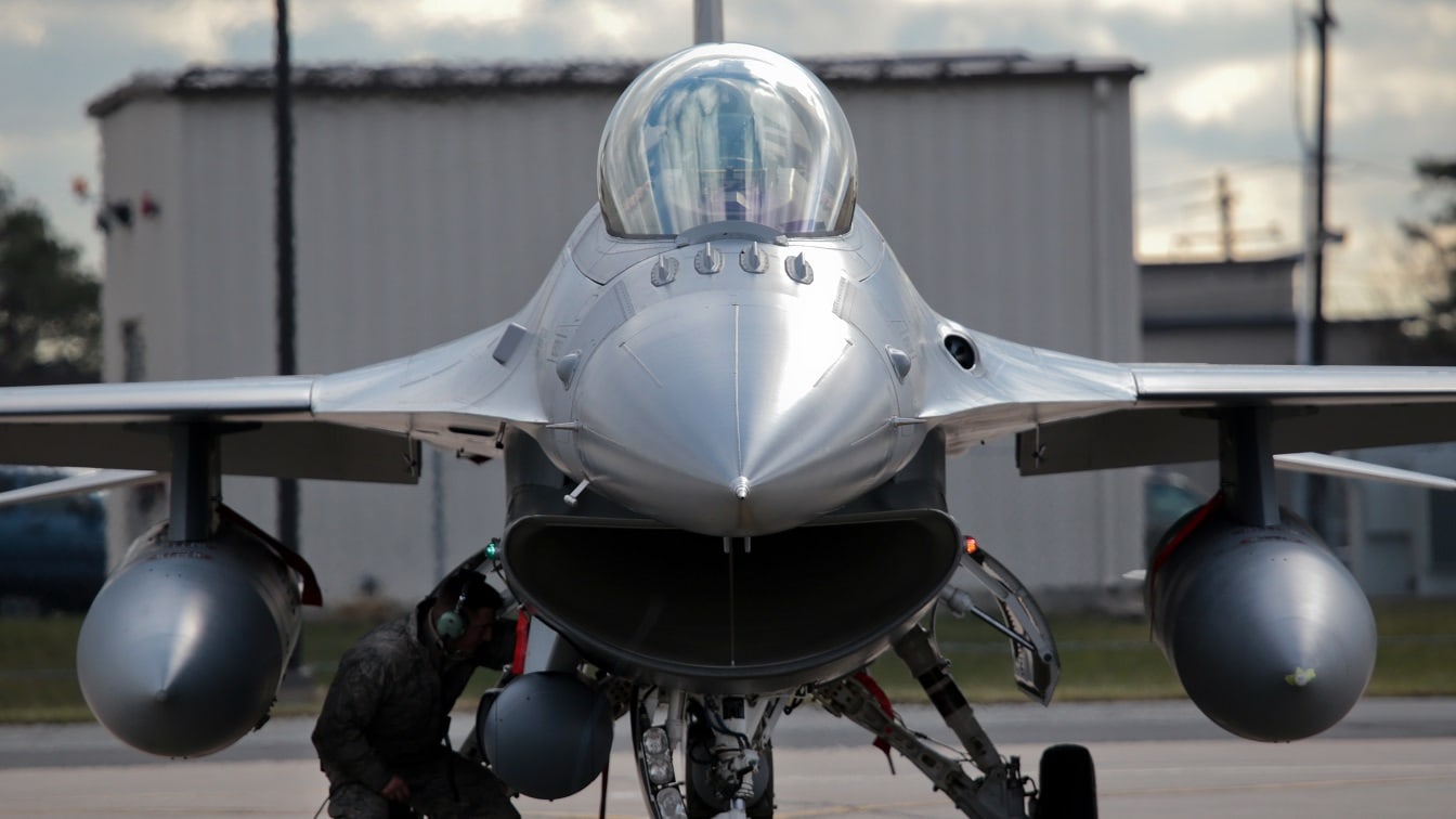 U.S. Air Force Senior Airman Austin Daniel, an F-16 crew chief from the New Jersey Air National Guard's 177th Fighter Wing, looks over his assigned aircraft prior to a training mission at Atlantic City Air National Guard Base, N.J., Dec. 17, 2014. (U.S. Air National Guard photo by Tech. Sgt. Matt Hecht/Released)