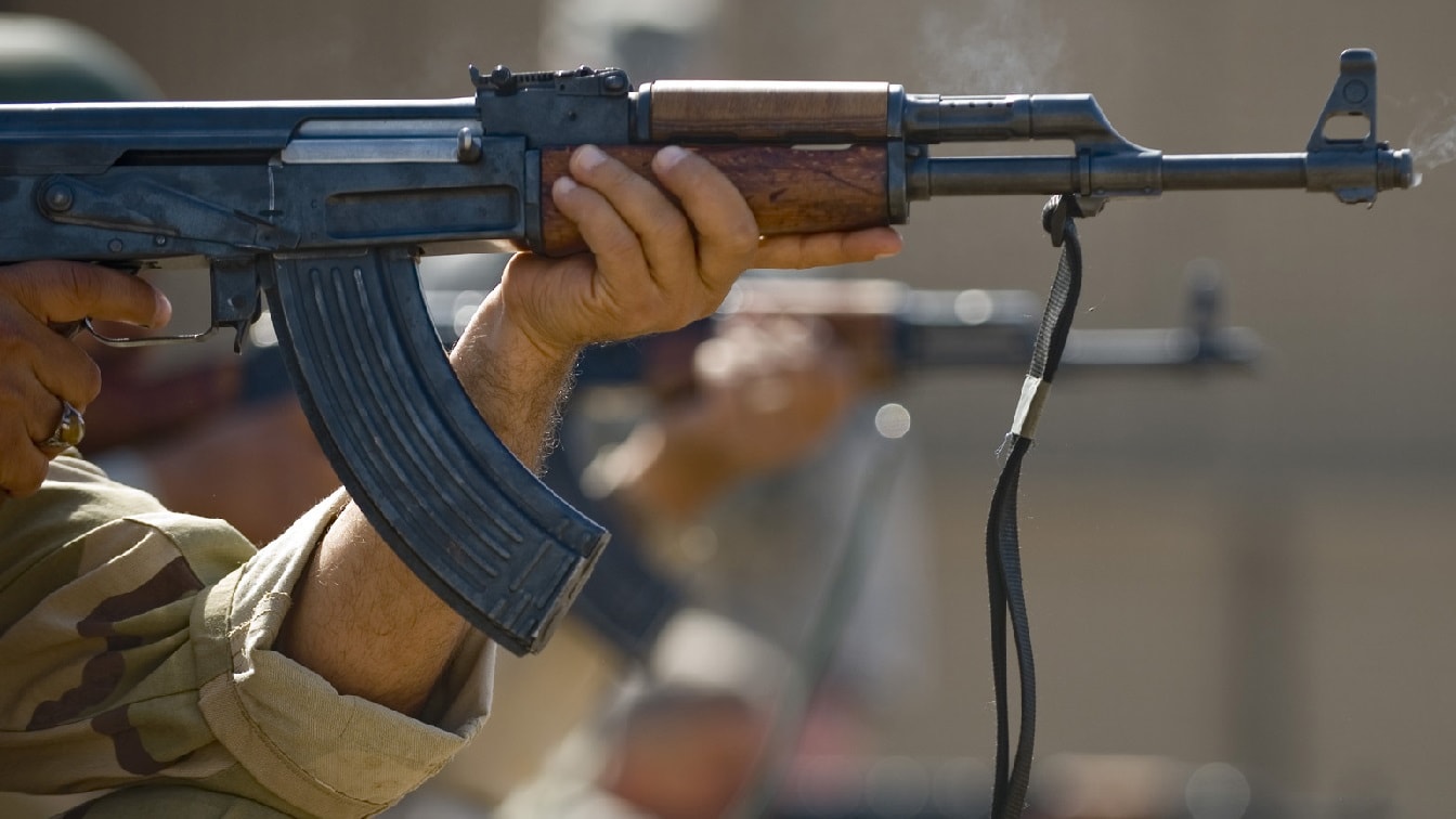 Iraqi airmen fire AK-47s during firing drills March 29, 2011. Members of the 447th Expeditionary Security Forces Squadron trained Iraqi security forces airmen ensuring weapons qualification and teaching defensive tactics, vehicle searches and other force protection measures. (U.S. Air Force photo/Staff Sgt. Levi Riendeau)