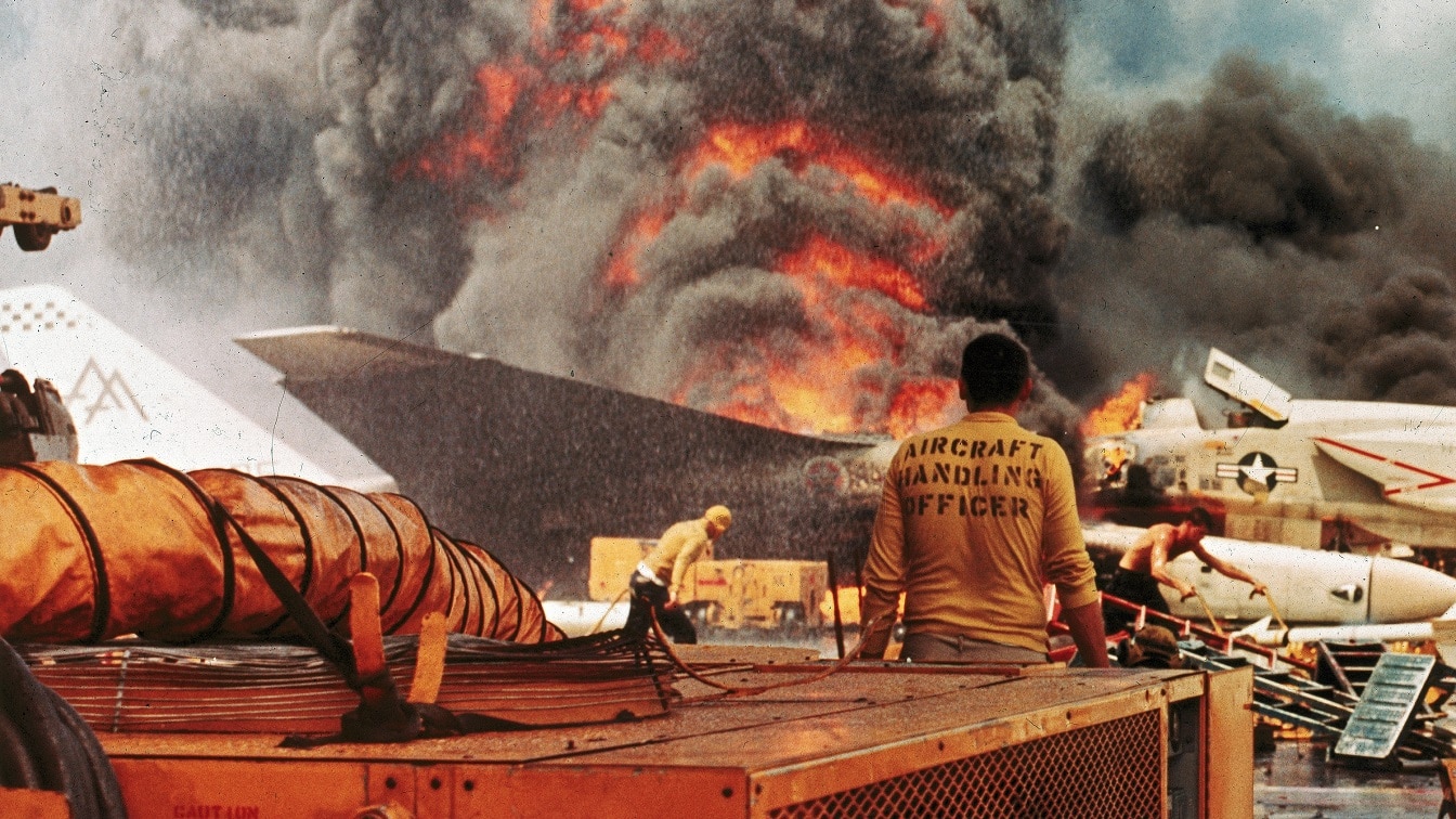 US Navy Aircraft Carrier USS Forrestal on Fire. Image Credit: Creative Commons.