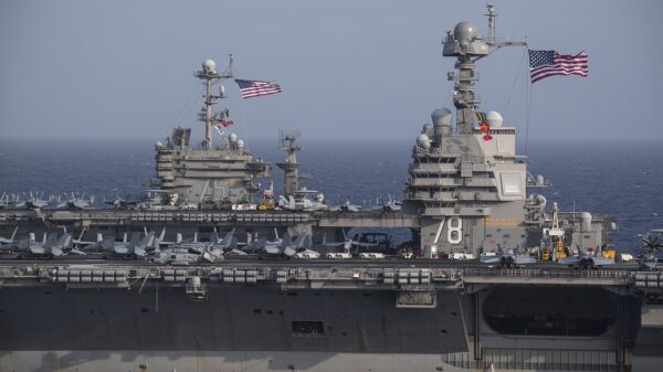 ATLANTIC OCEAN (June 4, 2020) The Ford-class aircraft carrier USS Gerald R. Ford (CVN 78) and the Nimitz-class aircraft carrier USS Harry S. Truman (CVN 75) transit the Atlantic Ocean, June 4, 2020, marking the first time a Ford-class and a Nimitz-class aircraft carrier have operated together underway. Gerald R. Ford is underway conducting integrated air wing operations and the Harry S. Truman Carrier Strike Group remains at sea in the Atlantic Ocean as a certified carrier strike group force ready for tasking in order to protect the crew from the risks posed by COVID-19, following their successful deployment to the U.S. 5th and 6th Fleet areas of operation. (U.S. Navy photo by Mass Communication Specialist 2nd Class Ruben Reed/Released