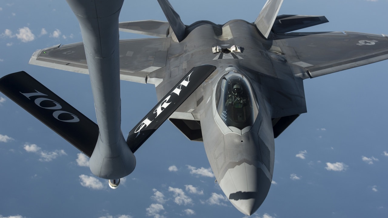 A U.S. Air Force F-22 Raptor from the 95th Fighter Squadron, Tyndall Air Force Base, Fla., moves into position behind a KC-135 Stratotanker from the 100th Air Refueling Wing, RAF Mildenhall Air Base, England, to conduct aerial refueling Sept. 4, 2015, over the Baltic Sea. The U.S. Air Force has deployed four F-22 Raptors, one C-17 Globemaster III, approximately 60 Airmen and associated equipment to Spangdahlem Air Base, Germany. While these aircraft and Airmen are in Europe, they will conduct air training with other Europe-based aircraft. (U.S. Air Force photo by Tech. Sgt. Jason Robertson/Released)