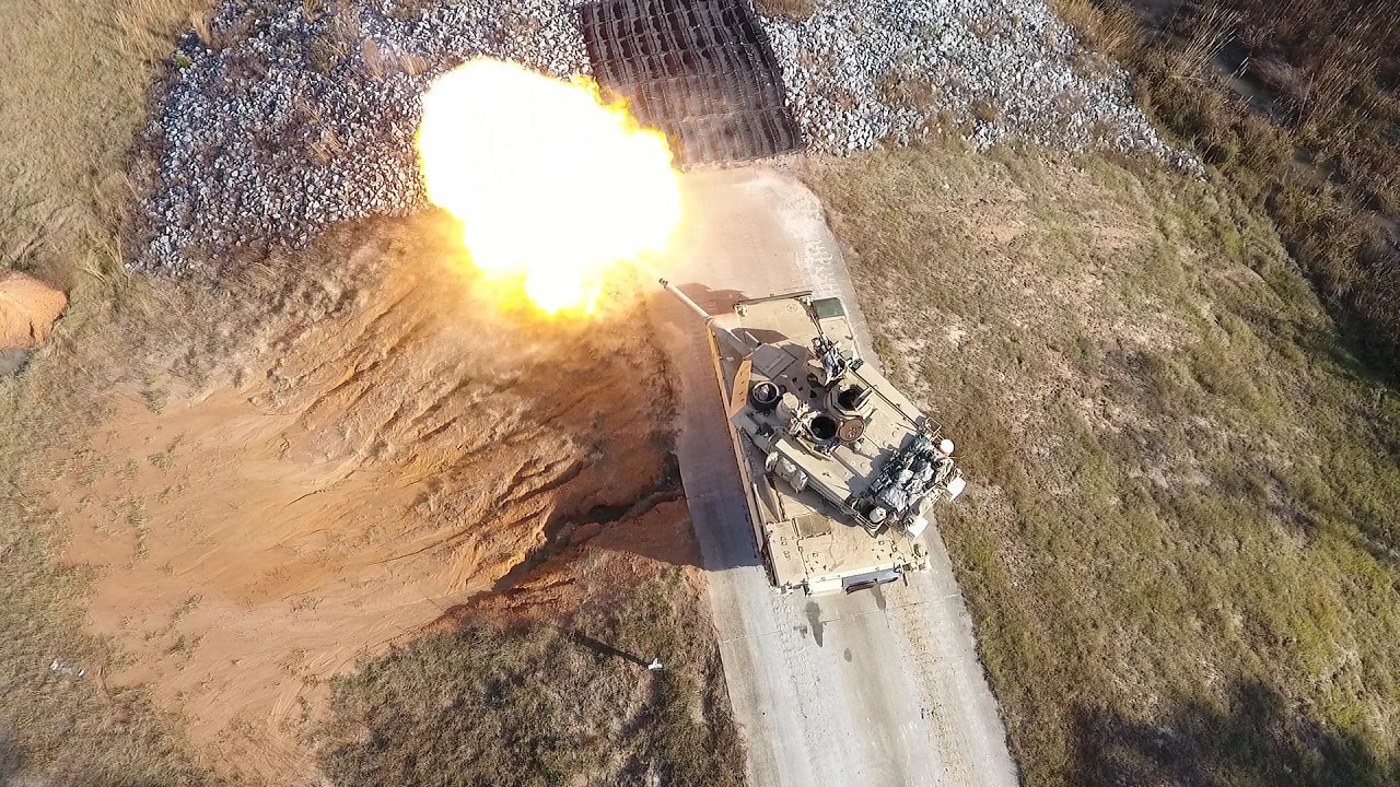 Image: Creative Commons. Aerial drone image of an M1A2 Abrams Main Battle Tank crew, from the 1st Armor Brigade Combat Team, 3rd Infantry Division, conducting Table VI Gunnery at Fort Stewart, Ga. December 6, 2016.