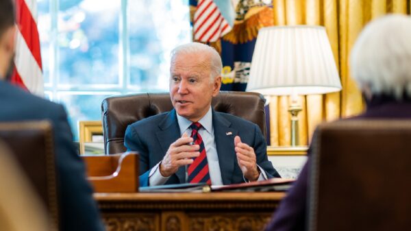 President Joe Biden meets with advisers before a phone call to Speaker of the House Nancy Pelosi (D-Calif.) and Senate Majority Leader Chuck Schumer (D-N.Y.) to discuss the debt ceiling, Tuesday, November 16, 2021, in the Oval Office. (Official White House Photo by Cameron Smith)