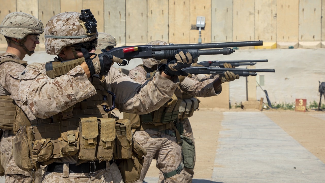 U.S. Marines with 2nd Battalion, 7th Marines, assigned to the Special Purpose Marine Air-Ground Task Force-Crisis Response-Central Command (SPMAGTF-CR-CC) 19.2, fire Mossberg 590A1 12-gauge shotguns at range at the Baghdad Embassy Compound in Iraq, May 8, 2020. The SPMAGTF-CR-CC is a crisis response force, prepared to deploy a variety of capabilities across the region. (U.S. Marine Corps Photo by Cpl. Brendan Custer)