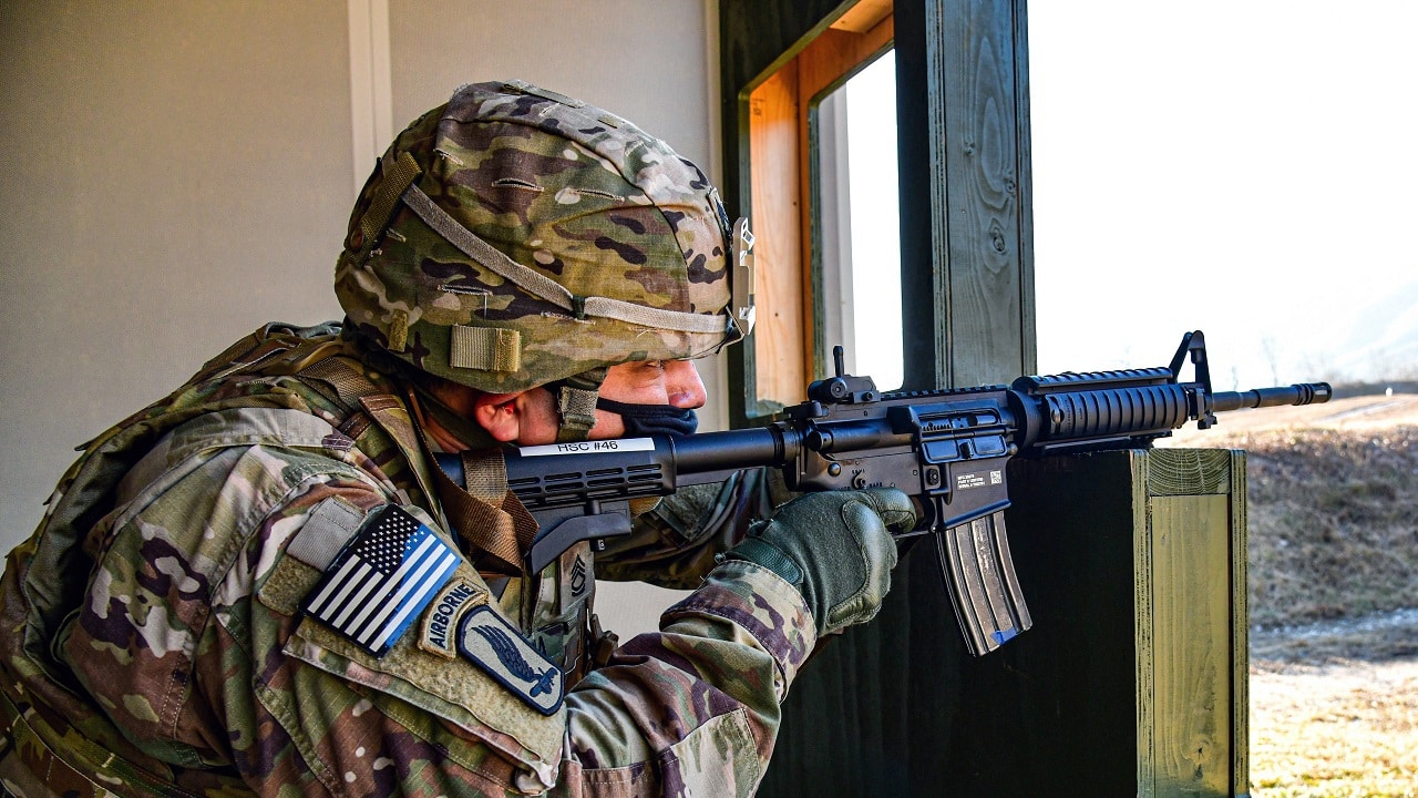 A Soldier assigned to U.S. Army Southern European Task Force, Africa engages pop-up targets with an M4 carbine during marksmanship training at Cao Malnisio Range in Pordenone, Italy, Jan. 26, 2021. (U.S. Army photo by Davide Dalla Massara)