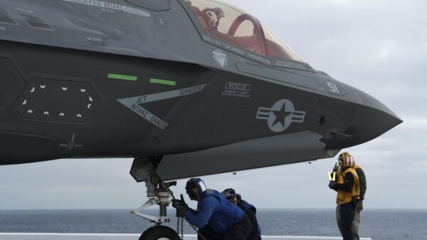 220119-N-CM110-2023 PACIFIC OCEAN (Jan. 19, 2022) -- Sailors chain down an F-35B Lightning II attached to Marine Operational Test and Evaluation Squadron (VMX) 1 on the flight deck aboard amphibious assault ship USS Tripoli (LHA 7), Jan. 19. Tripoli is underway conducting routine operations in U.S. 3rd Fleet. (U.S. Navy photo by Mass Communication Specialist 3rd Class Maci Sternod)
