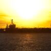 (July 8, 2012) The aircraft carrier USS George Washington (CVN 73) conducts an early morning replenishment at sea with the George Washington Strike Group. George Washington is forward deployed to Yokosuka, Japan, and is underway in the U.S. 7th Fleet area of responsibility. (U.S. Navy photo by Mass Communication Specialist 3rd Class Paul Kelly/Released) .