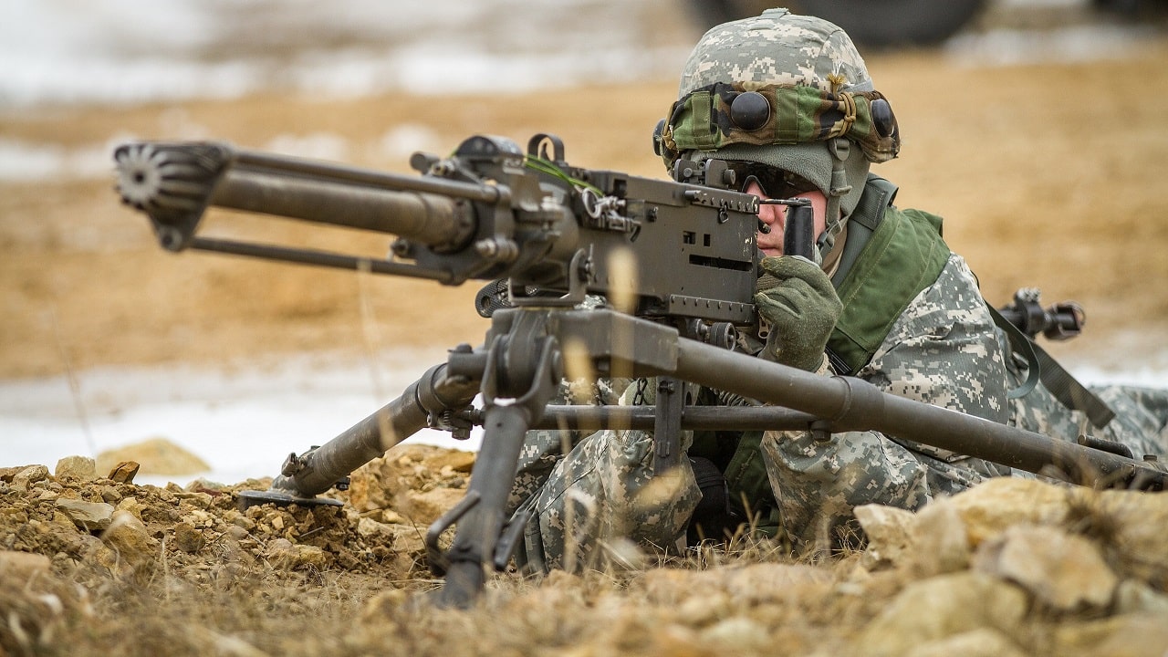 U.S. Army Pvt. Kyle Coyer with the 996th Engineer Company from Milwaukee, Wis., provides security for a road repair operation at Fort McCoy, Wis., March 27, 2014. The operation was part of a yearly War Exercise involving more than 4,500 Soldiers. (U.S. Army photo by Spc. Robert Farrell/Released)