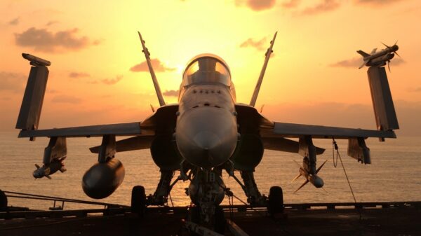 At sea aboard USS John C. Stennis, December 18, 2001 - After an early morning round of flight operations, an F/A-18 Hornet awaits the next round of combat flight operations aboard the USS John C. Stennis (CVN 74). Stennis and her embarked Carrier Air Wing Nine (CVW-9) are supporting Operation Enduring Freedom. U.S. Navy photo by Photographer's Mate 3rd Class Jayme Pastoric