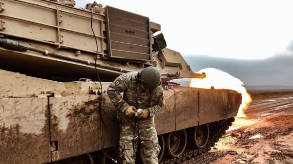 U.S. Army Sgt. Ryan Duginski, M1 Abrams Tank Master Gunner, assigned to Battle Group Poland, performs a tank remote-fire procedure to ensure firing capabilities function properly at Bemowo Piskie Training Area, Poland, Nov. 6. (Photos by U.S. Army 1LT Christina Shoptaw)