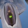 A U.S. Air Force F-22 Raptor receives fuel from a U.S. Air Force KC-135 Stratotanker assigned to the 340th Expeditionary Air Refueling Squadron, above the U.S. Central Command area of responsibility, March 14, 2022. The F-22 Raptor is a fifth-generation aircraft that combines stealth, supercruise, maneuverability, integrated avionics, and is designed to project air dominance, rapidly and at great distances, and deter regional aggressors while deployed in the USCENTCOM AOR. (U.S. Air Force photo by Staff Sgt. Frank Rohrig)