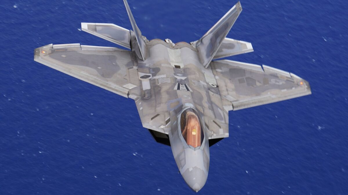 F-22 Hawaiian Raptor flies over Joint Base Pearl Harbor-Hickam, Hawaii, Dec. 5, 2019. Image Creative Commons. 