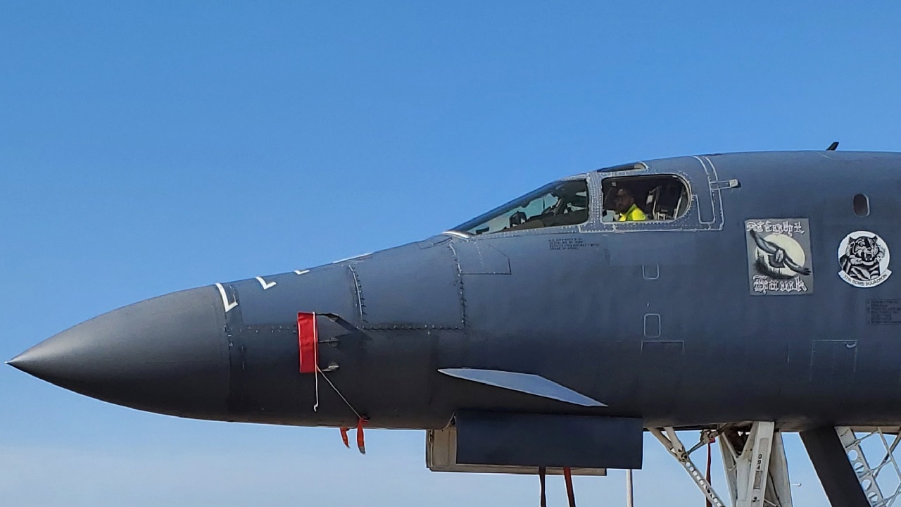 A B-1B Lancer, tail number 86-0094, is moved across Douglas Blvd. to the Maintenance Repair and Overhaul Technology Center (MROTC) to receive an initial portion of Gate 1 of programmed depot maintenance April 21. 567th AMXS personnel will perform three days of maintenance which include single system checks on 40 individual actuators validating voltage outputs as well as interrogating each actuator for hydraulic leaks. After single systems are completed, the horizontal stabilizers will be removed from the aircraft. This is the first time that horizontal stabilizers have ever been removed at the MROTC. Once complete, the aircraft and horizontal stabilizers will be brought back across Douglas to the 569th AMXS strip facility for plastic media blasting. Once stripped, the horizontal stabilizers will be routed to the 76th Commodities Maintenance Group for overhaul and repairs. (U.S. Air Force photo/Kelly White)