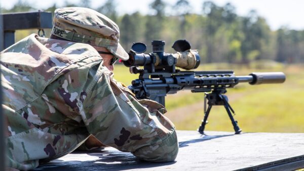 U.S Army Sgt. Matthew Fiore, a UH-60 Black Hawk crew chief representing the Marietta-based 78th Aviation Troop Command, Georgia National Guard, engages targets with the M2010 Enhanced Sniper Rifle at the sniper event during the 2022 Georgia National Guard Best Warrior Competition at Fort Stewart, Ga., March 21, 2022. The Best Warrior Competition tests the readiness and adaptiveness of our forces, preparing our Georgia Guardsmen to meet today’s unpredictable challenges. (U.S. Army photo by Sgt. 1st Class R.J. Lannom Jr.)