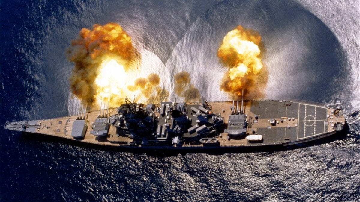 Iowa-class battleship firing a broadside. Image Credit: Creative Commons.