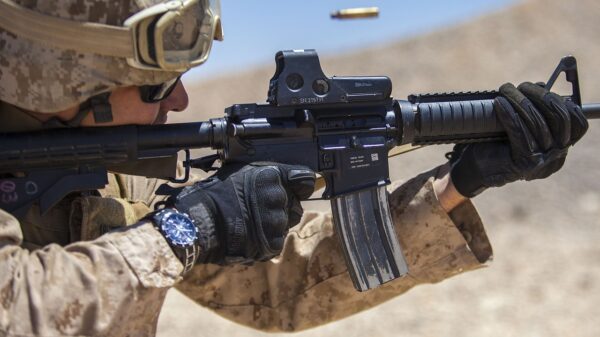 A 26th Marine Expeditionary Unit (MEU) Maritime Raid Force Marine fires an M4 Carbine at a range in Jordan, June 19, 2013. Exercise Eager Lion 2013 is an annual, multinational exercise designed to strengthen military-to-military relationships and enhance security and stability in the region by responding to modern-day security scenarios. The 26th MEU is deployed to the 5th Fleet area of responsibility as part of the Kearsarge Amphibious Ready Group. The 26th MEU operates continuously across the globe, providing the president and unified combatant commanders with a forward-deployed, sea-based quick reaction force. (U.S. Marine Corps photograph by Sgt. Christopher Q. Stone, 26th MEU Combat Camera/Released)