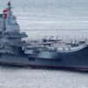 Members of the People's Liberation Army navy are seen on board China's aircraft carrier Liaoning as it sails into Hong Kong, China July 7, 2017. REUTERS/Bobby Yip