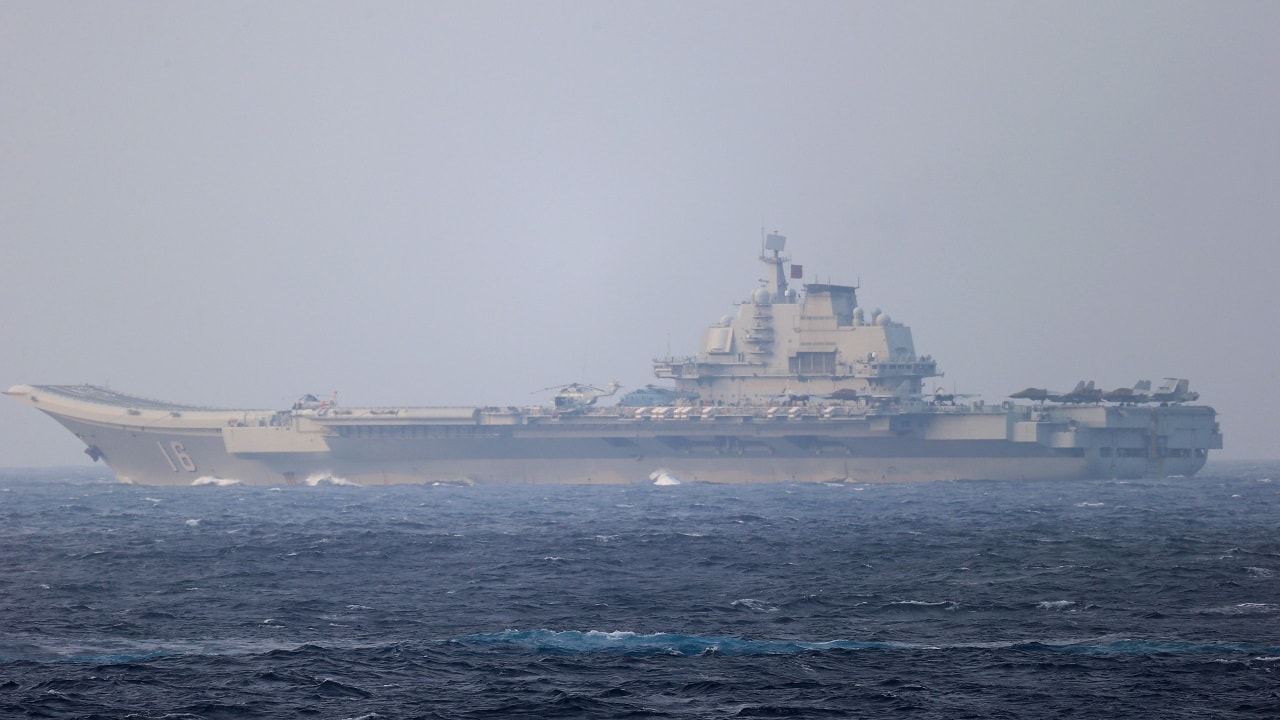 Chinese aircraft carrier Liaoning sails through the Miyako Strait near Okinawa on its way to the Pacific in this handout photo