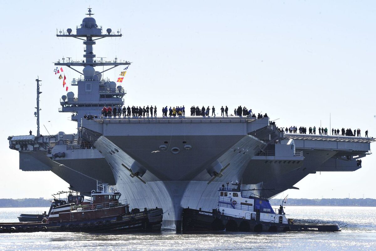 NEWPORT NEWS, Va. (April 8, 2017) - Pre-Commissioning Unit Gerald R. Ford (CVN 78) Sailors man the rails as the ship departs Huntington Ingalls Industries Newport News Shipbuilding for builder’s sea trials off the coast. The first- of-class ship—the first new U.S. aircraft carrier design in 40 years—will spend several days conducting builder’s sea trials, a comprehensive test of many of the ship’s key systems and technologies. (U.S. Navy photo by Chief Mass Communication Specialist Christopher Delano).