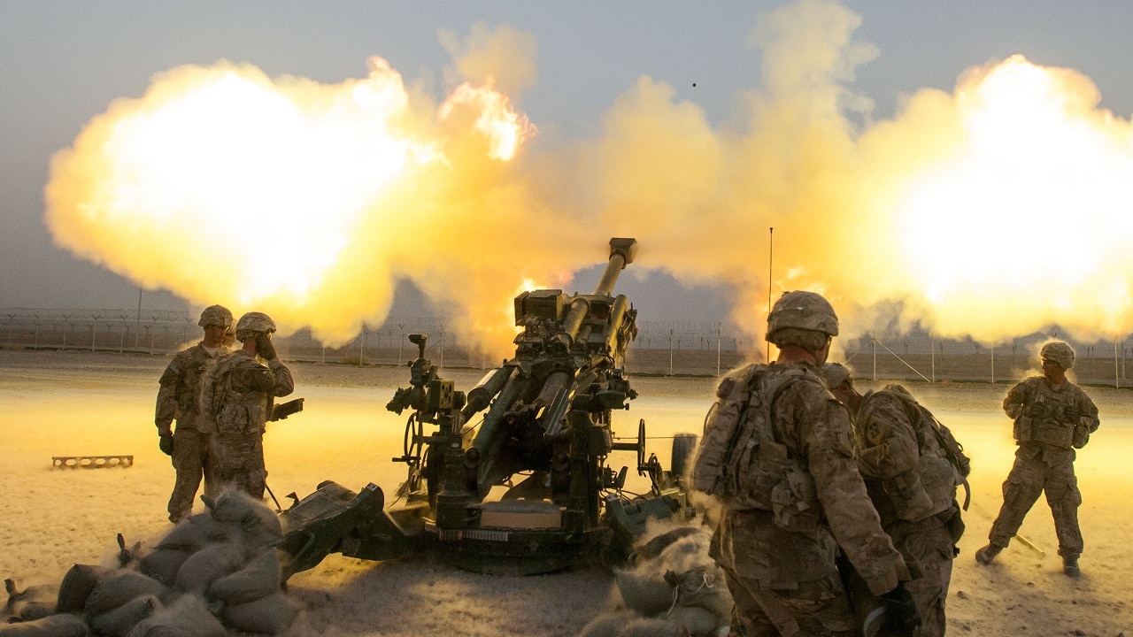 Soldiers serving with Alpha Battery, 2nd Battalion, 77th Field Artillery Regiment, 4th Infantry Brigade Combat Team, 4th Inf. Division, shoot a round down range from their M777A2 howitzer on Kandahar Airfield, Afghanistan, Aug. 22, 2014. The round was part of a shoot to register, or zero, the howitzers, which had just arrived on KAF from Forward Operating Base Pasab. The shoot also provided training for a fire support team from 1st Battalion, 12th Infantry Regiment, 4th IBCT, 4th Inf. Div.
