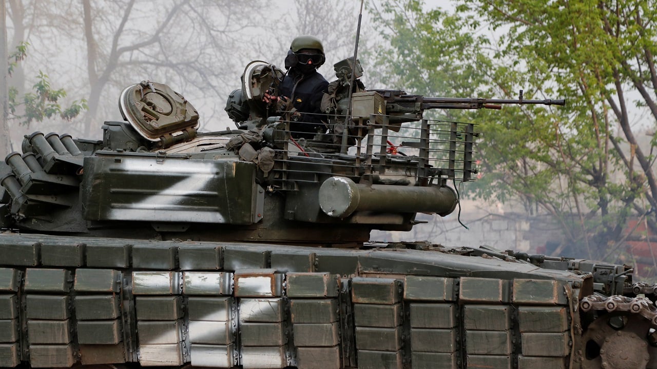 A service member of pro-Russian troops is seen atop a tank during fighting in Ukraine-Russia conflict near the Azovstal steel plant in the southern port city of Mariupol, Ukraine May 5, 2022. Picture taken May 5, 2022. REUTERS/Alexander Ermochenko