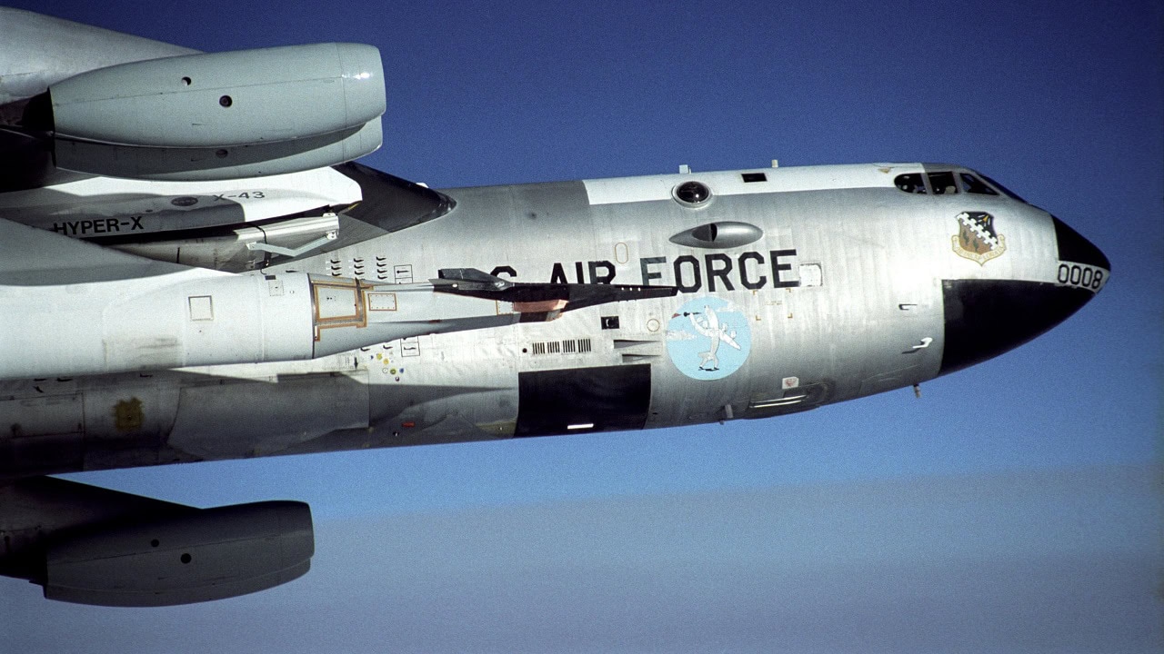 The X-43A was a small experimental research aircraft designed to flight-demonstrate the technology of airframe-integrated supersonic ramjet or "scramjet" propulsion at hypersonic speeds above Mach 5, or five times the speed of sound. Its scramjet engine is an air-breathing engine in which the airflow through the engine remains supersonic.