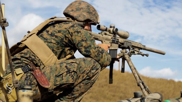 MARINE CORPS BASE HAWAII, Hawaii (July 6, 2022) U.S. Marine Corps Pfc. Darrel Ebaugh, a scout sniper with Weapons Company, Battalion Land Team, 3d Battalion, 4th Marine Regiment, Marine Air-Ground Task Force 7 (MAGFT-7), sights in on a target during a live-fire sniper range in support of Rim of the Pacific (RIMPAC) 2022, on Marine Corps Base Hawaii, July 6, 2022. Twenty-six nations, 38 ships, four submarines, more than 170 aircraft and 25,000 personnel are participating in RIMPAC from June 29 to Aug. 4 in and around the Hawaiian Islands and Southern California. The world’s largest international maritime exercise, RIMPAC provides a unique training opportunity while fostering and sustaining cooperative relationship among participants critical to ensuring the safety of sea lanes and security on the world’s oceans. RIMPAC 2022 is the 28th exercise in the series that began in 1971. (U.S. Marine Corps photo by Lance Cpl. Brayden Daniel)