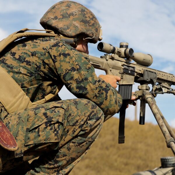 MARINE CORPS BASE HAWAII, Hawaii (July 6, 2022) U.S. Marine Corps Pfc. Darrel Ebaugh, a scout sniper with Weapons Company, Battalion Land Team, 3d Battalion, 4th Marine Regiment, Marine Air-Ground Task Force 7 (MAGFT-7), sights in on a target during a live-fire sniper range in support of Rim of the Pacific (RIMPAC) 2022, on Marine Corps Base Hawaii, July 6, 2022. Twenty-six nations, 38 ships, four submarines, more than 170 aircraft and 25,000 personnel are participating in RIMPAC from June 29 to Aug. 4 in and around the Hawaiian Islands and Southern California. The world’s largest international maritime exercise, RIMPAC provides a unique training opportunity while fostering and sustaining cooperative relationship among participants critical to ensuring the safety of sea lanes and security on the world’s oceans. RIMPAC 2022 is the 28th exercise in the series that began in 1971. (U.S. Marine Corps photo by Lance Cpl. Brayden Daniel)