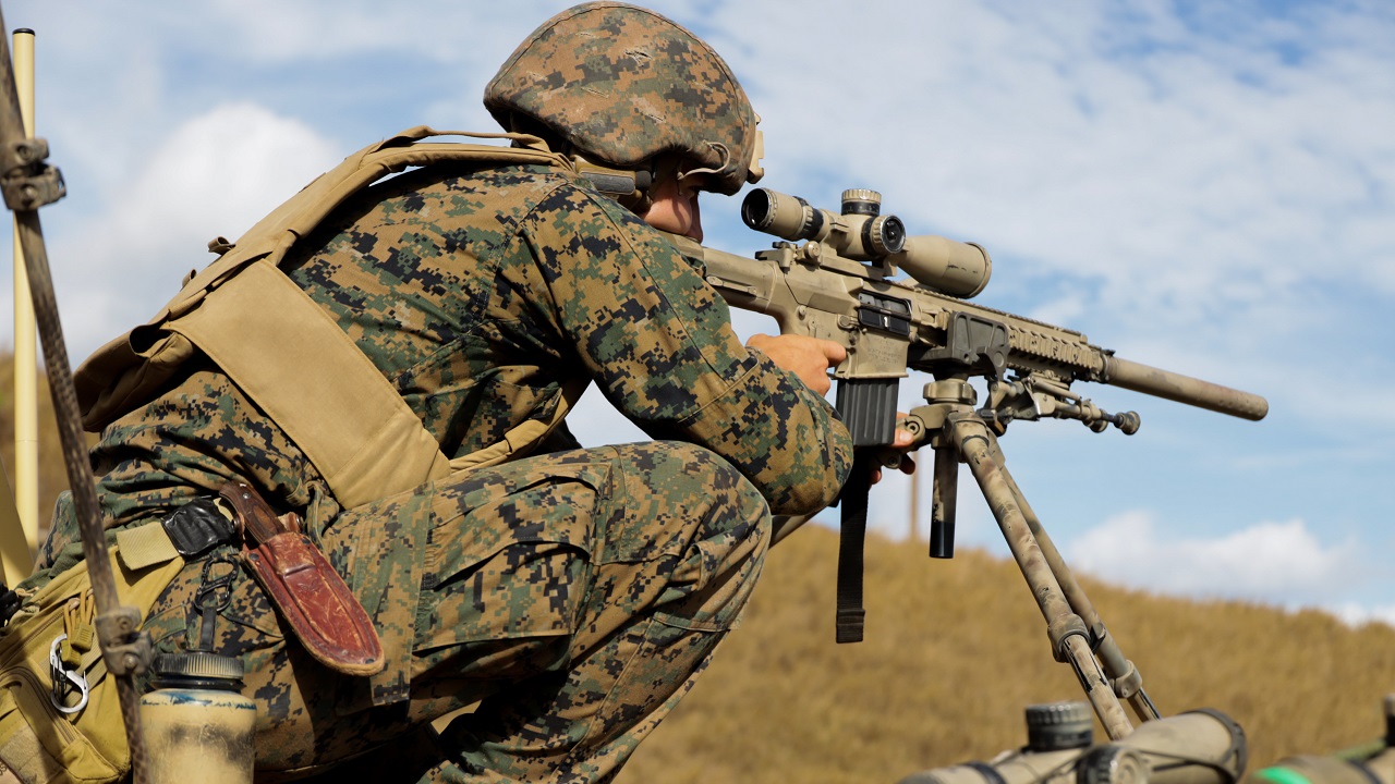 MARINE CORPS BASE HAWAII, Hawaii (July 6, 2022) U.S. Marine Corps Pfc. Darrel Ebaugh, a scout sniper with Weapons Company, Battalion Land Team, 3d Battalion, 4th Marine Regiment, Marine Air-Ground Task Force 7 (MAGFT-7), sights in on a target during a live-fire sniper range in support of Rim of the Pacific (RIMPAC) 2022, on Marine Corps Base Hawaii, July 6, 2022. Twenty-six nations, 38 ships, four submarines, more than 170 aircraft and 25,000 personnel are participating in RIMPAC from June 29 to Aug. 4 in and around the Hawaiian Islands and Southern California. The world’s largest international maritime exercise, RIMPAC provides a unique training opportunity while fostering and sustaining cooperative relationship among participants critical to ensuring the safety of sea lanes and security on the world’s oceans. RIMPAC 2022 is the 28th exercise in the series that began in 1971. (U.S. Marine Corps photo by Lance Cpl. Brayden Daniel)